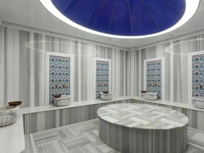 The luxurious interior of a marble Turkish bath (Hammam) in Marmaris.
