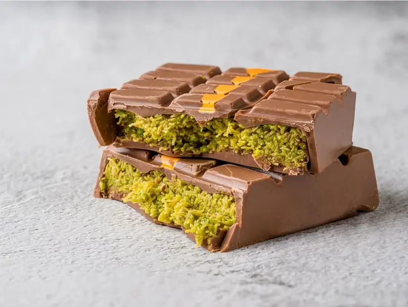 Unique pistachio-stuffed chocolate bar with a rich, green filling.