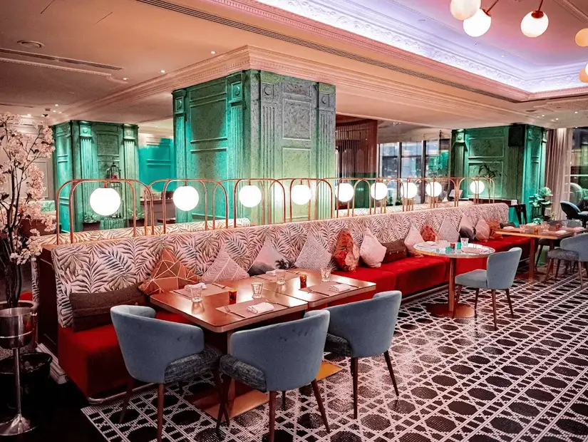 Trendy, minimalist cafe with a stylish, spacious interior.
