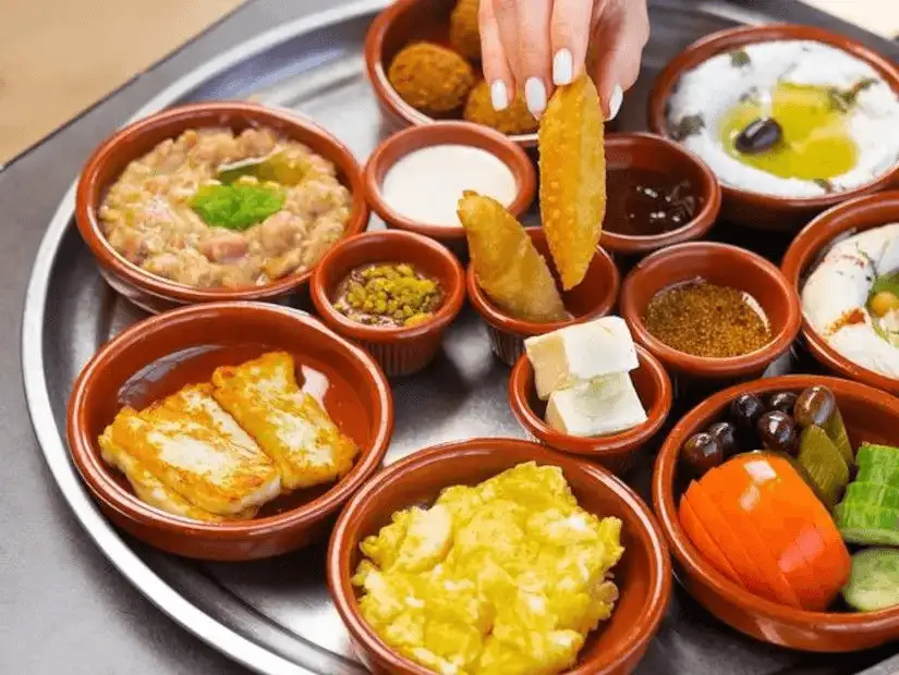 Middle-Eastern falafel and hummus platter, perfect for a hearty meal.