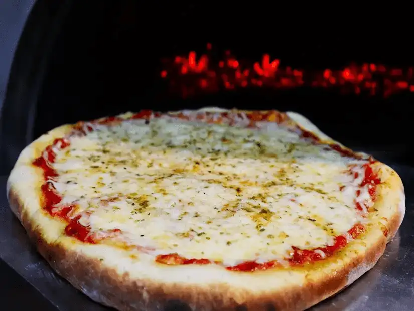 Freshly baked pizza straight from the wood-fired oven.