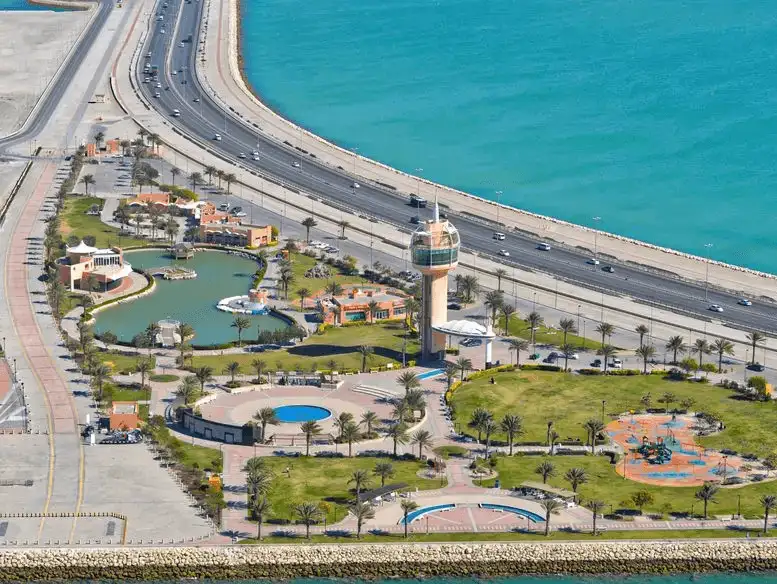 An aerial view of Prince Khalifa Bin Salman Park, a scenic waterfront attraction.