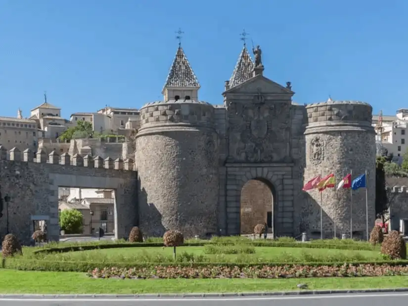 An impressive medieval gate guarding the ancient city of Toledo.