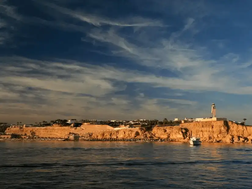 The scenic Ras Um Sid Plateau at sunset, featuring panoramic views of the Red Sea and surrounding landscapes.