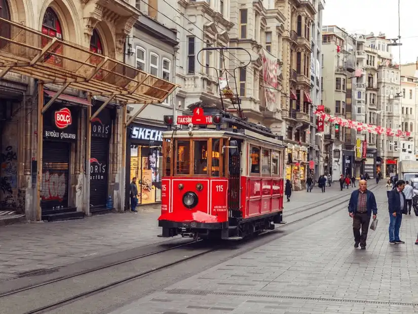 The iconic Red Tram travels down İstiklal Street in Istanbul.