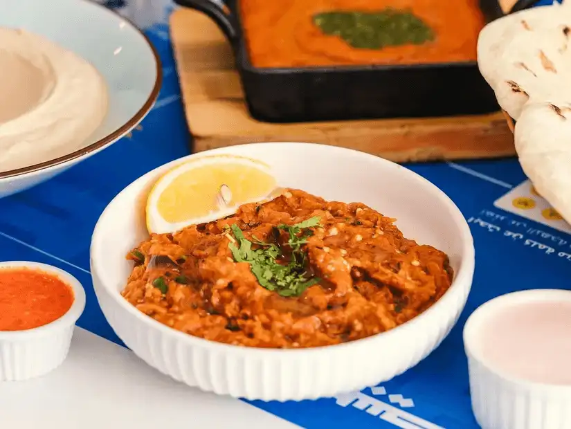 Rich and creamy Indian curry served with fresh naan bread.