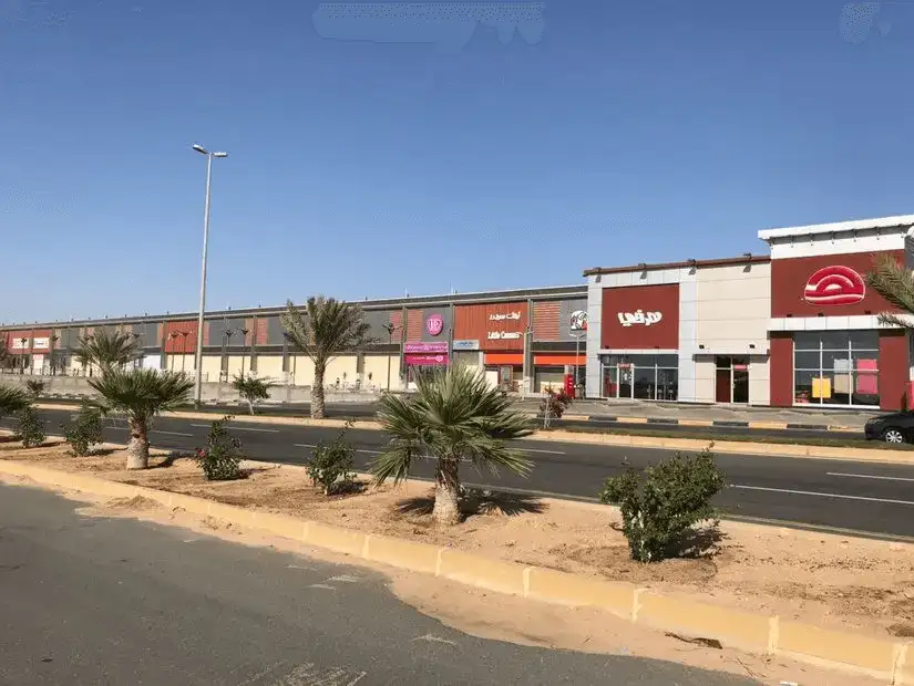 Panoramic view of a bustling shopping complex in Saudi Arabia.