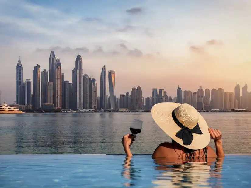 Luxurious infinity pool at SLS Dubai Hotel & Residences, offering stunning views of the city skyline.