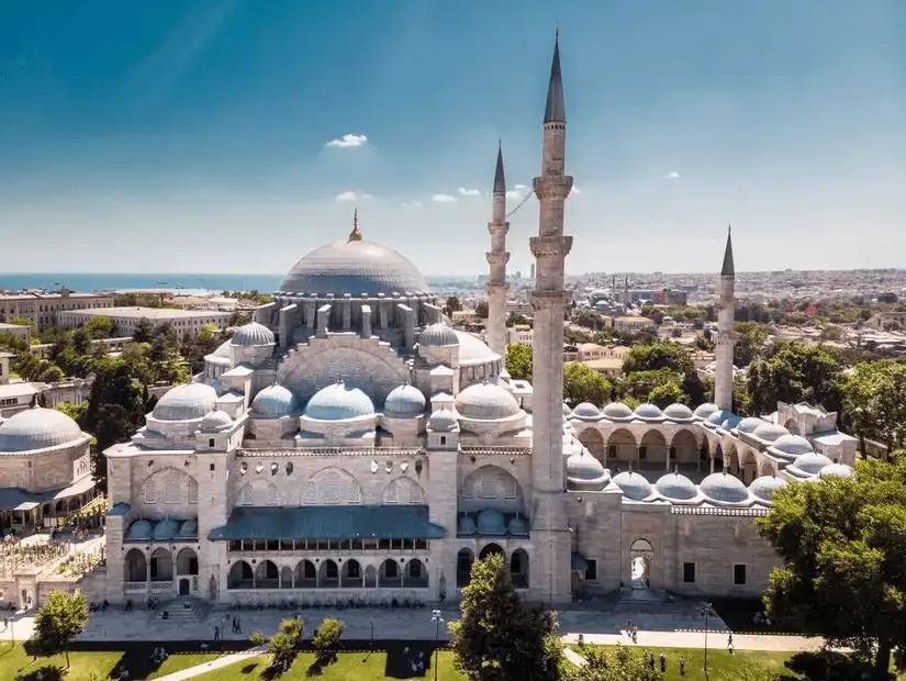 A majestic aerial view of the Suleymaniye Mosque, showcasing its grand dome and minarets.
