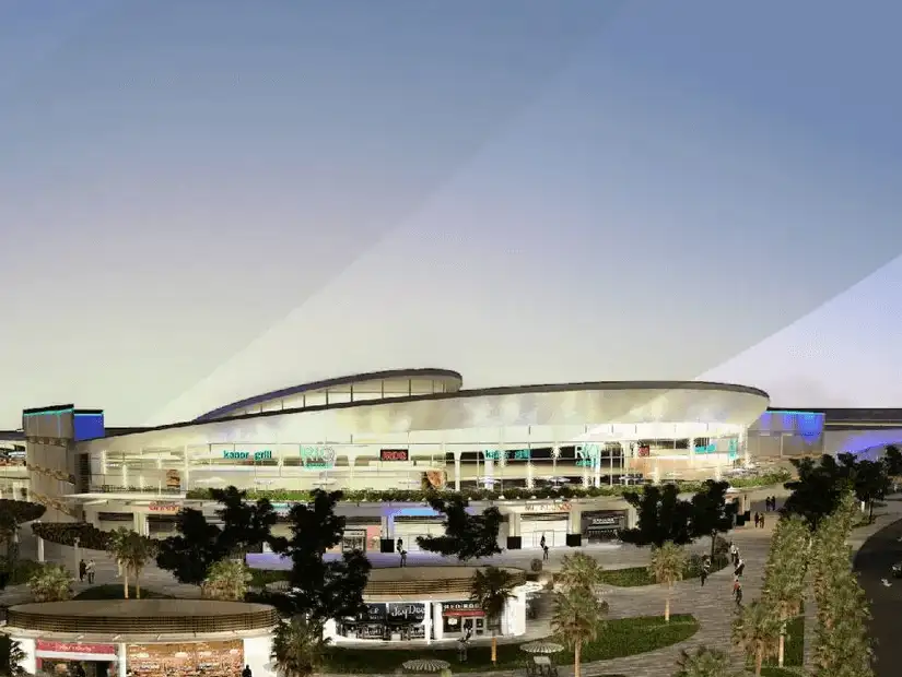 Sleek, curved mall at dusk.