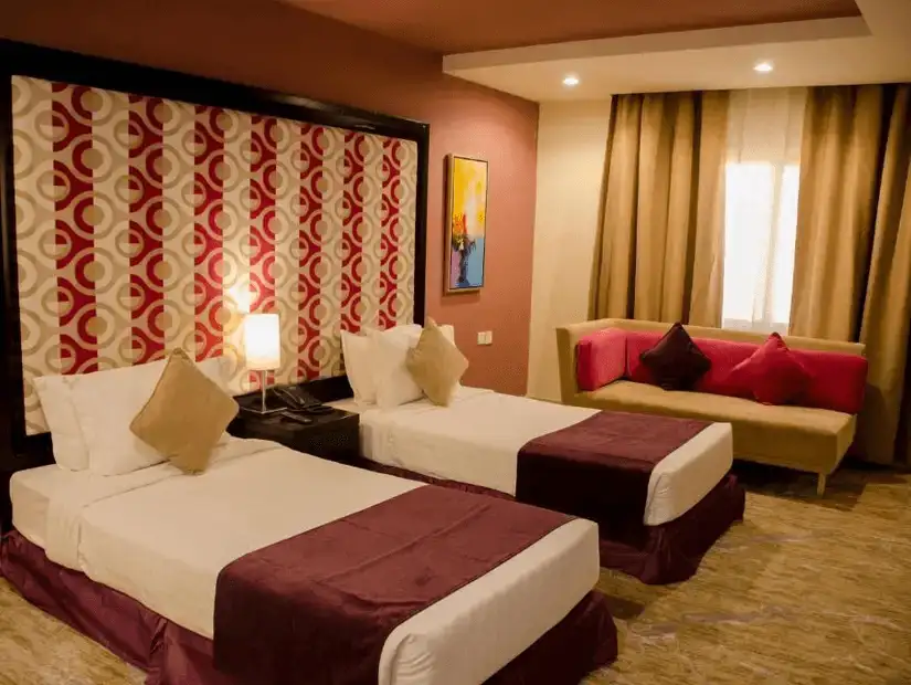 A luxurious hotel suite with elegant furnishings and a serene ambiance.