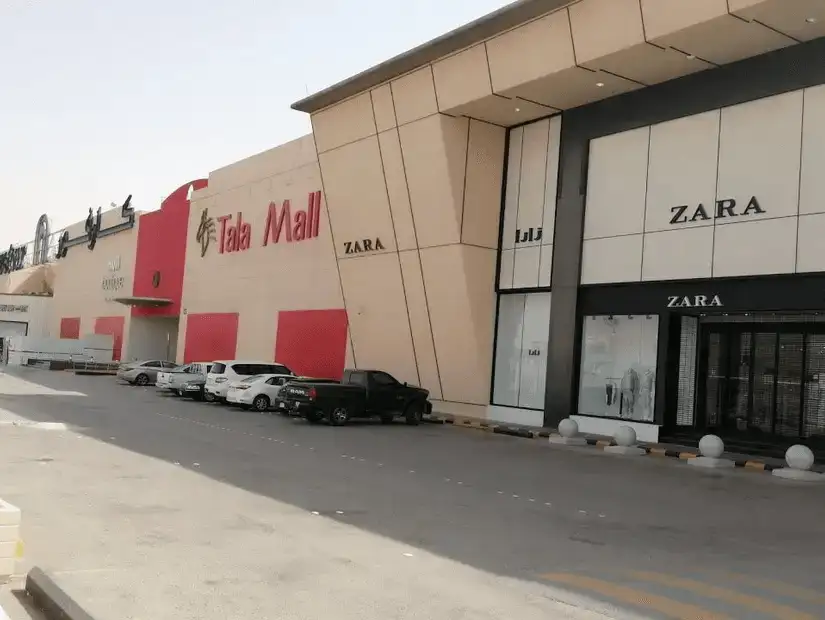 The exterior of Tala Mall showcasing fashion stores.