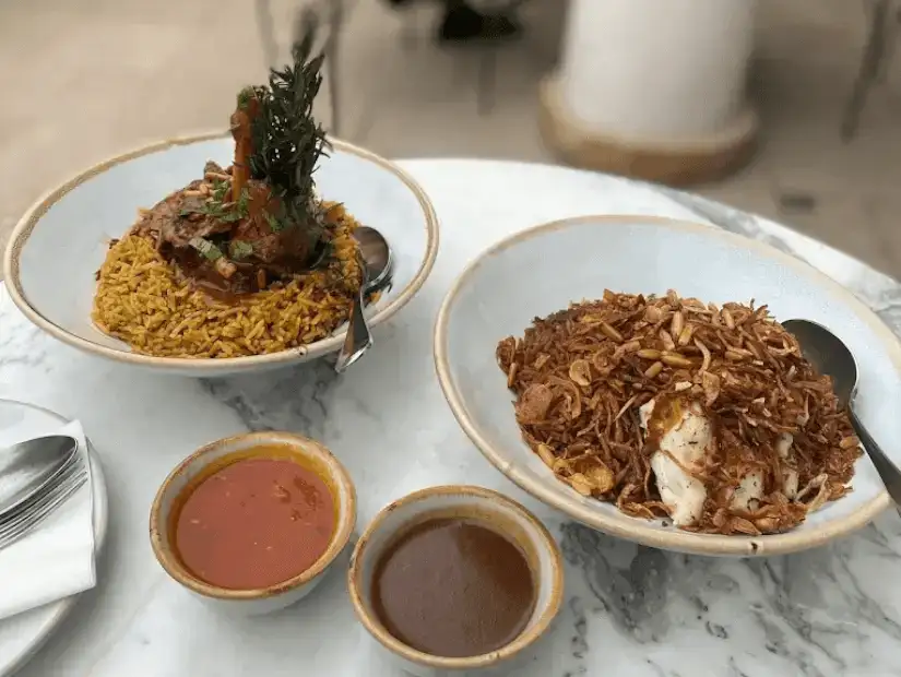 A fine dining setup with an array of beautifully presented food items.