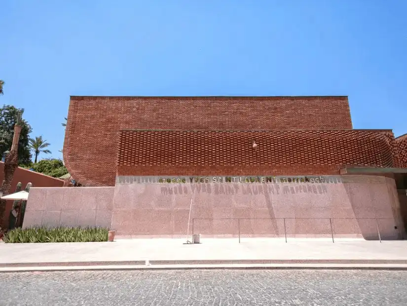 The modern facade of the Yves Saint Laurent Museum in Marrakesh, dedicated to the legendary fashion designer's work.