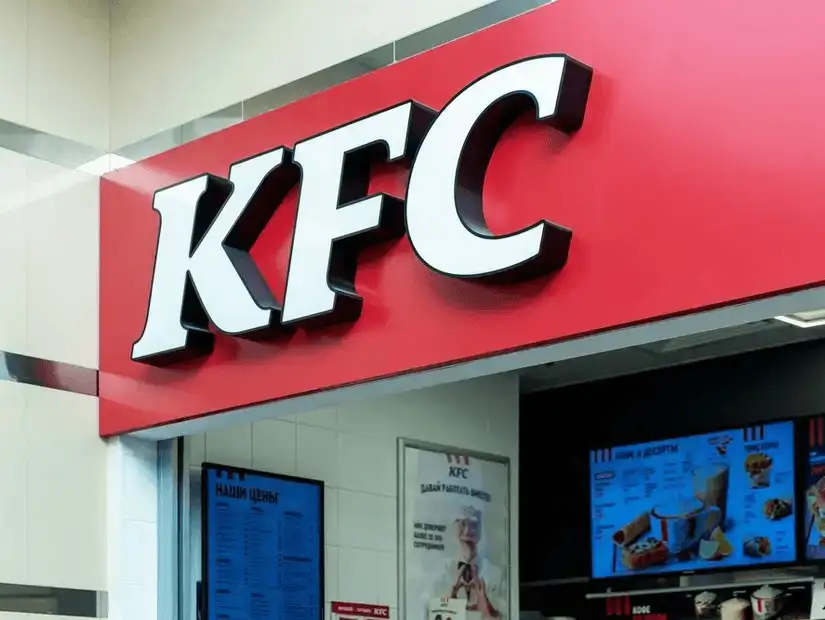 KFC storefront inviting customers with its iconic red and white signage